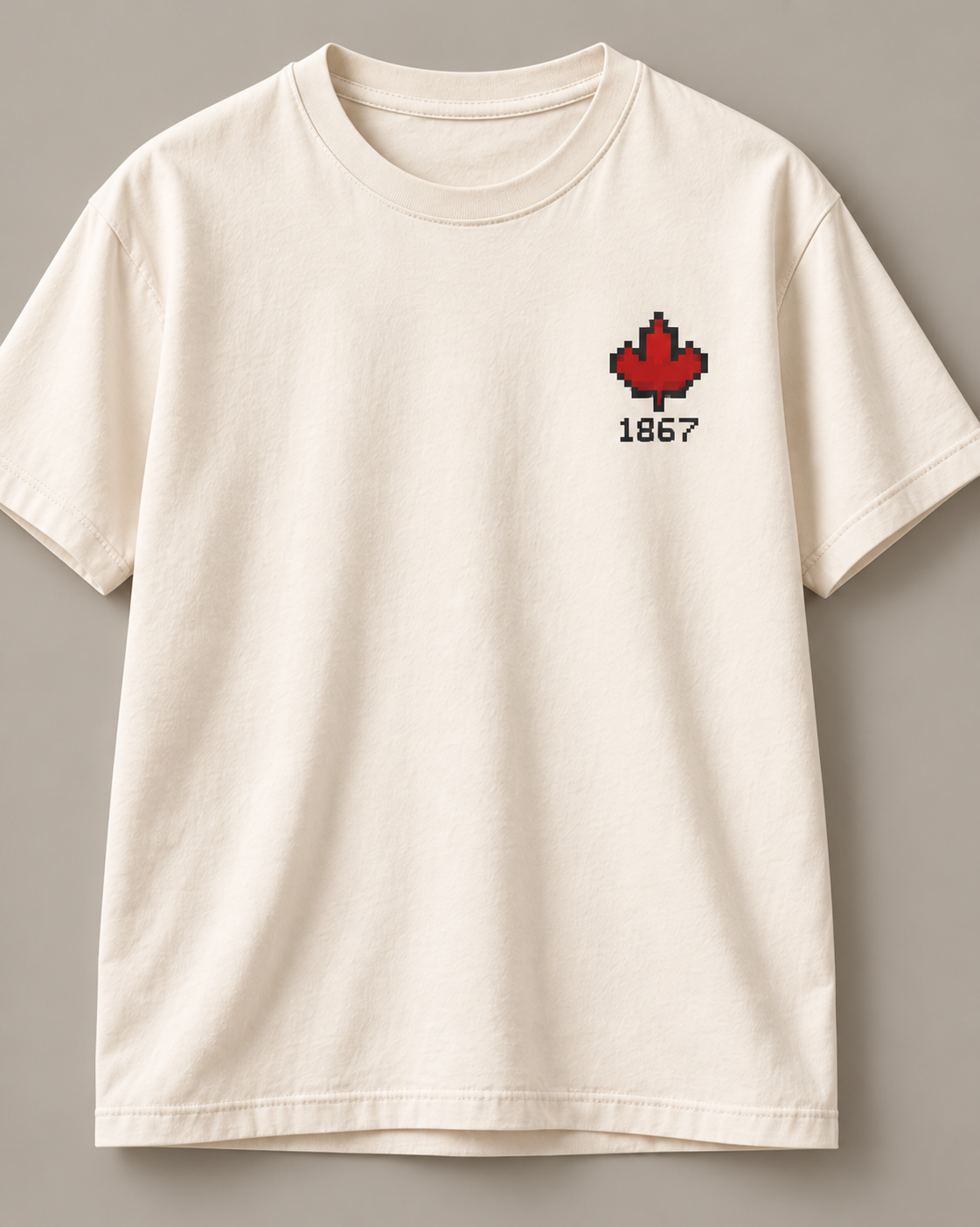Cream T-shirt with a blocky red pixel maple leaf and 1867