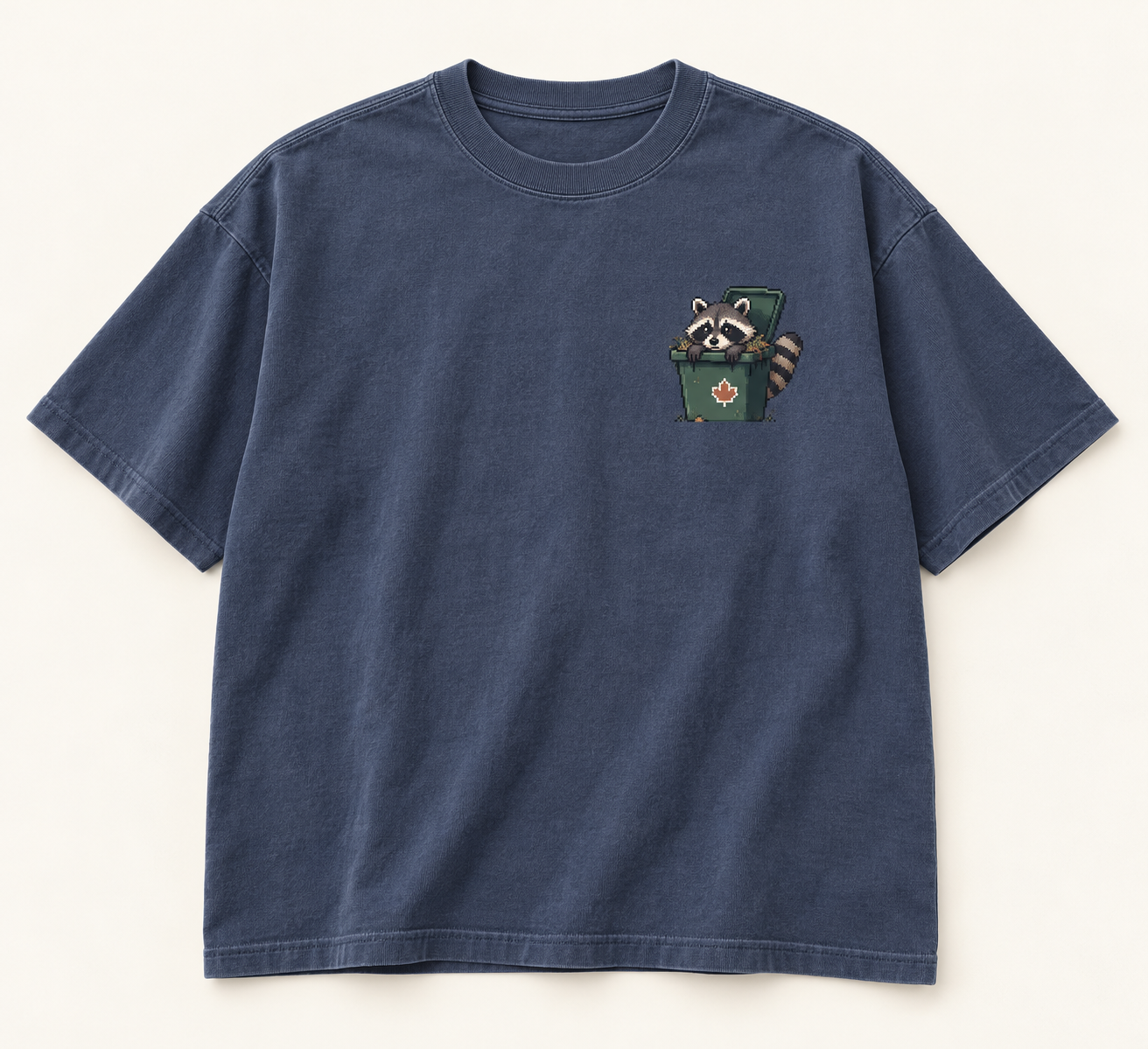 Washed slate-navy T-shirt with a pixel raccoon climbing out of a green Toronto compost bin
